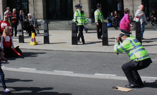 Photographer Policeman at the London Marathon